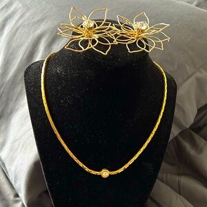 Gold toned choker and earrings set